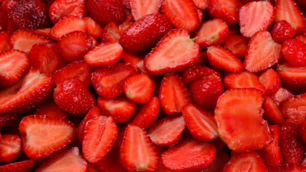 istock Strawberry slices. Fresh berries macro. Fruit background. Top view. 1154597985