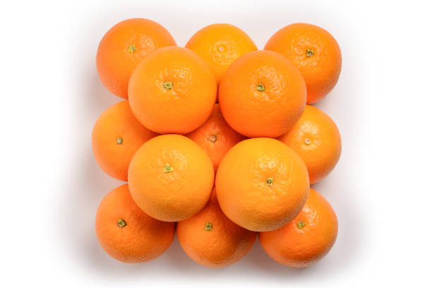 istock Pyramid of Oranges isolated on white background. 1154598021