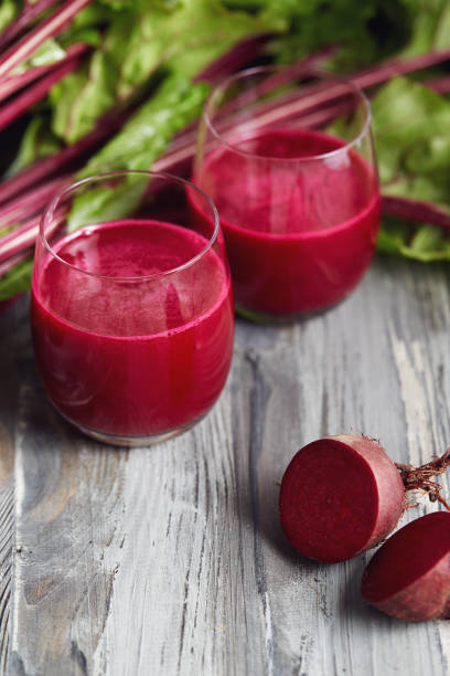 istock Detox juice with freshly picked bunch of beetroot 1154600452