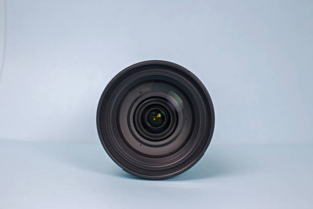 istock Photography camera lens, front view isolated on pastel background 1154601819