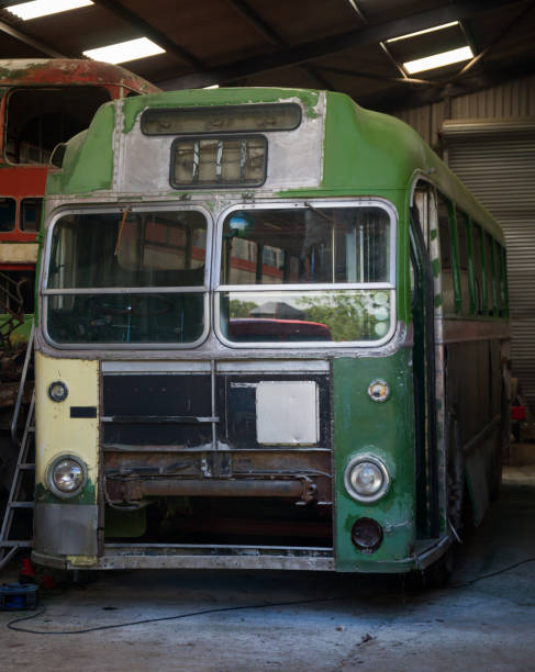 istock vintage old retro green bus in garage 1154602152