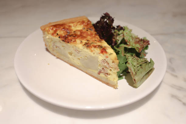 istock a French pie ,  traditional open pie with egg, cheese 1154602297