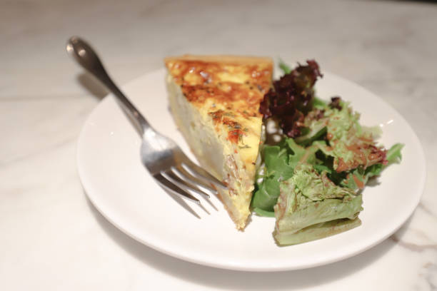 istock a French pie ,  traditional open pie with egg, cheese 1154602302