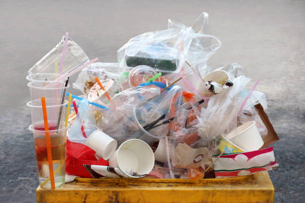 istock Garbage, Dump, Plastic waste, Pile of Garbage Plastic Waste Bottle and Bag Foam tray many on bin yellow, Plastic Waste Pollution 1154603733