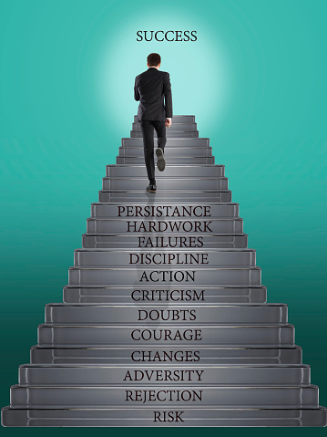 Businessman successful in career ladder concept