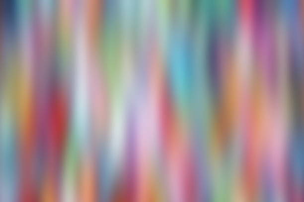 istock Colorful Blurred defocused vertical motion effect multi color lights texture, Colorful of glittering shine background 1154605260