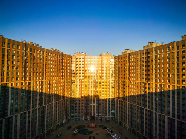 istock Sunset in backyard of residential building 1154607503