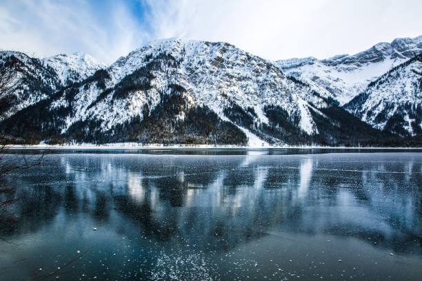 istock Mountaines reflect in the lake. 1154612720