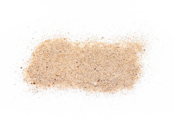 istock Real light brown grained Sand isolated on white as Background or Texture 1154612921