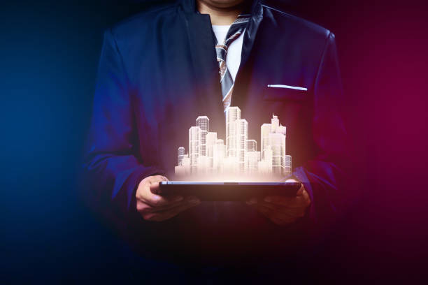 istock Businessman with city project 1154613159