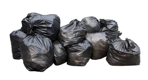 waste, black garbage bags plastic pile stack isolated on white background, lots pile of garbage black bags stack