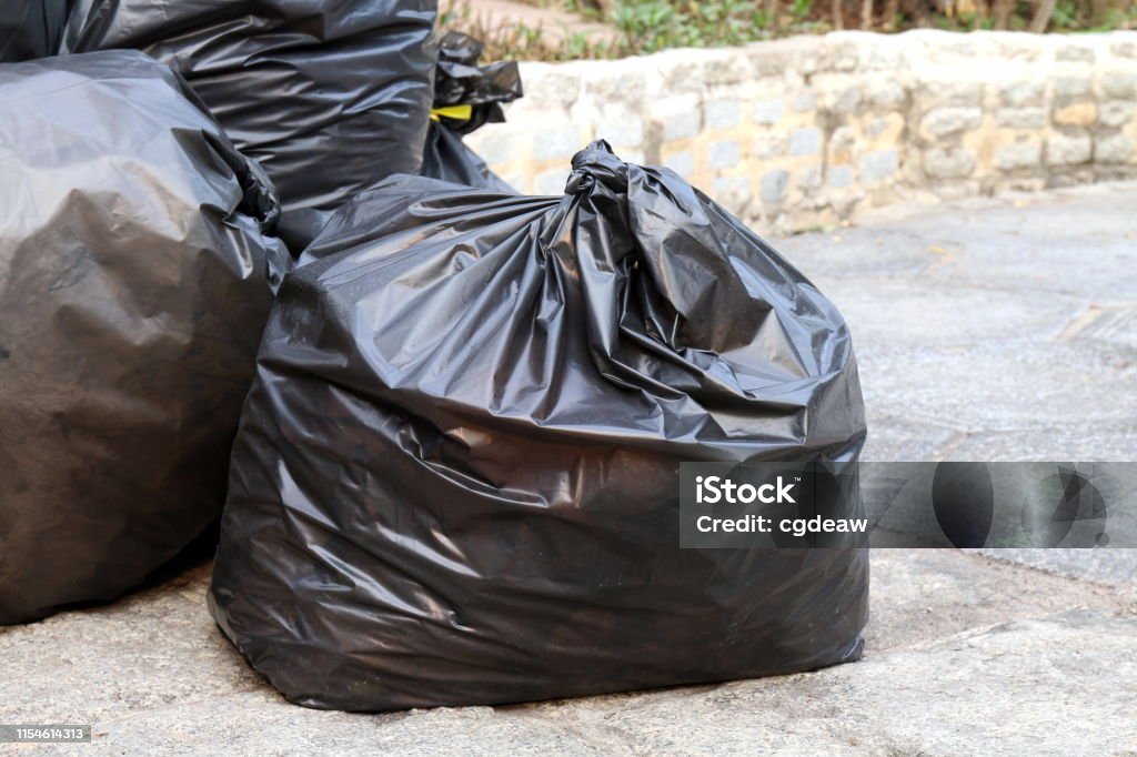 https://media.istockphoto.com/id/1154614313/photo/waste-pile-of-garbage-black-bags-plastic-stack-on-the-floor-ground.jpg?s=1024x1024&w=is&k=20&c=d7vRSq3mgAL3QXc6NgGX5_OGRXE0SDTI1ALZXfT339Y=