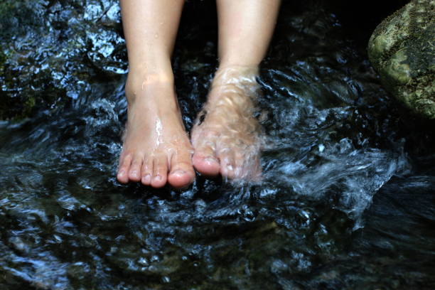 istock Foot Soak in the water stream relax 1154614359