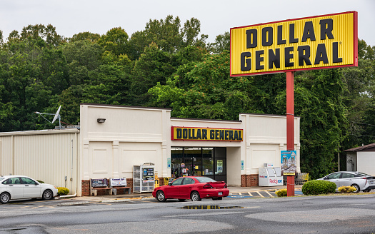 Bethlehem, NC, USA-June 5, 2019: A local Dollar General store and street sign, in the community of Bethlehem, NC.