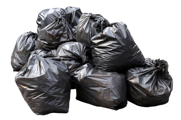 istock waste, black garbage bags plastic pile stack isolated on white background, lots pile of garbage black bags stack 1154620212