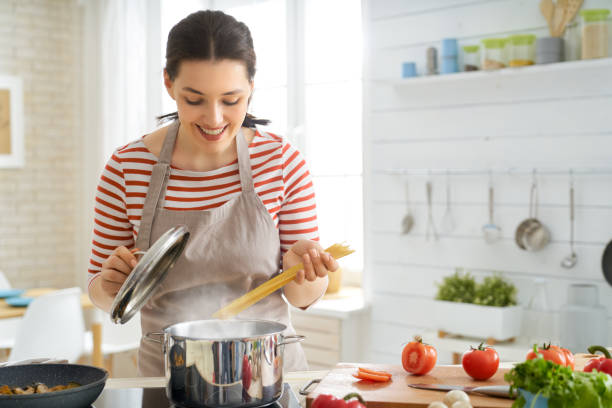 istock woman is preparing proper meal 1154623252