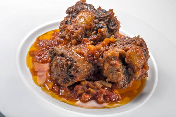 istock Isolated Dish with a portion of oxtail stewed vaccinara 1154629019
