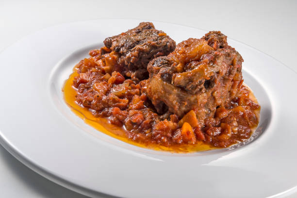 istock Isolated Dish with a portion of oxtail stewed vaccinara 1154629088