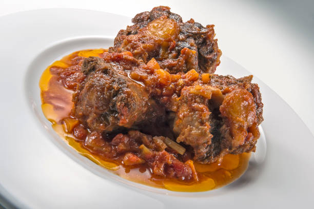 istock Isolated Dish with a portion of oxtail stewed vaccinara 1154629307