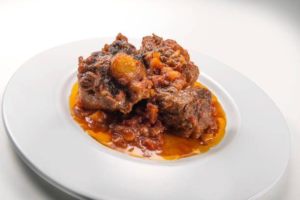istock Isolated Dish with a portion of oxtail stewed vaccinara 1154629644