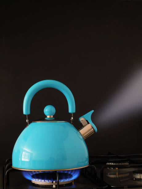 istock Kettle boiling water on a gas flame kitchen hob 1154633432