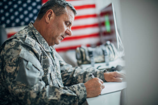 istock Senior military man working 1154635634