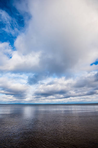 istock windy sea beach with white sand and blue water 1154637284
