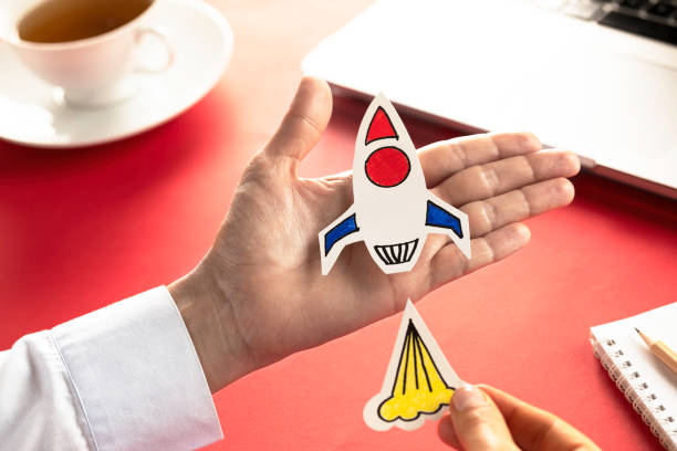 istock Business Person with Startup Rocket 1154638494
