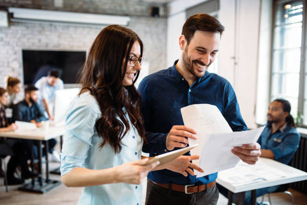 istock Portrait of architects having discussion in office 1154647541