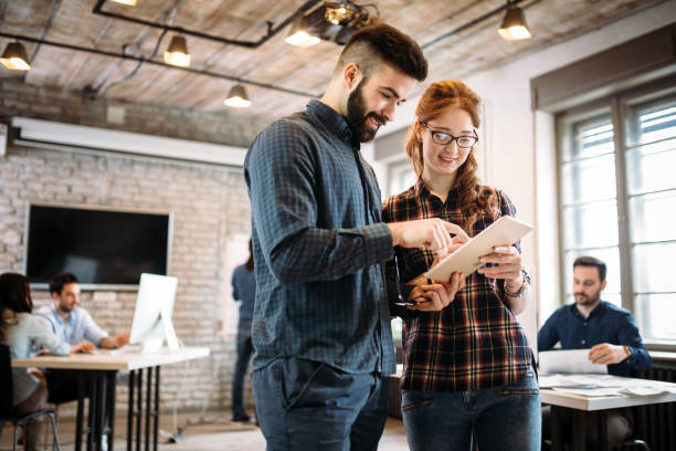 istock Portrait of architects having discussion in office 1154647563