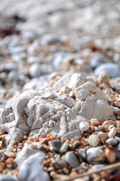 istock Sand and stones on a beach, macro photography and backgrounds 1154652440