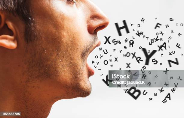 Close Up Of A Young Man Speaks Words Power Watch Your Words Concept Stock Photo - Download Image Now