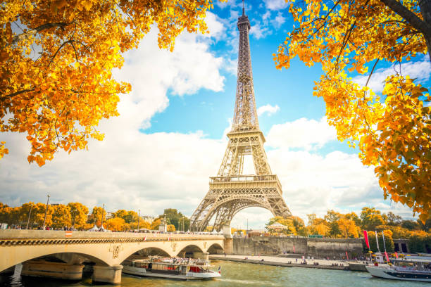 istock eiffel tour over Seine river 1154656598