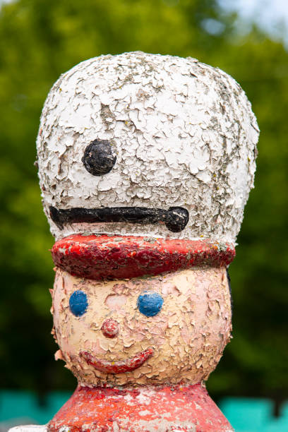 istock Weathered cement toy soldier 1154656639