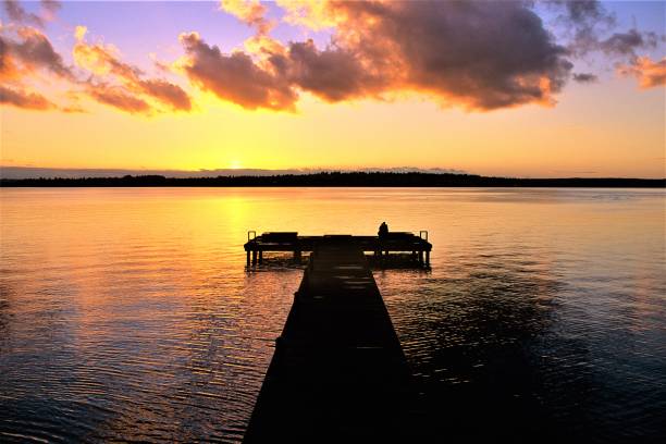 istock Seattle from Kirkland Waterfront Park at Sunset over Lake Washington with Passing Low Clouds Kirkland Washington USA 1154660876