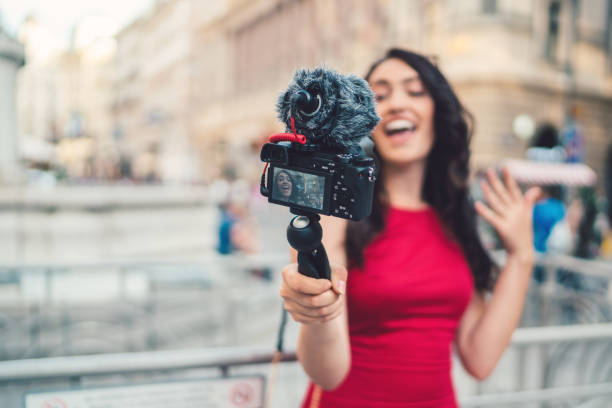 istock Attractive woman vlogging from Vienna 1154665017