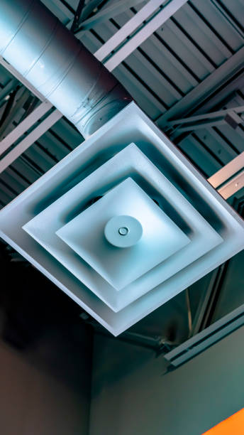 istock Panorama frame Close up view of a square air conditioner ventilator connected to a pipe 1154666424