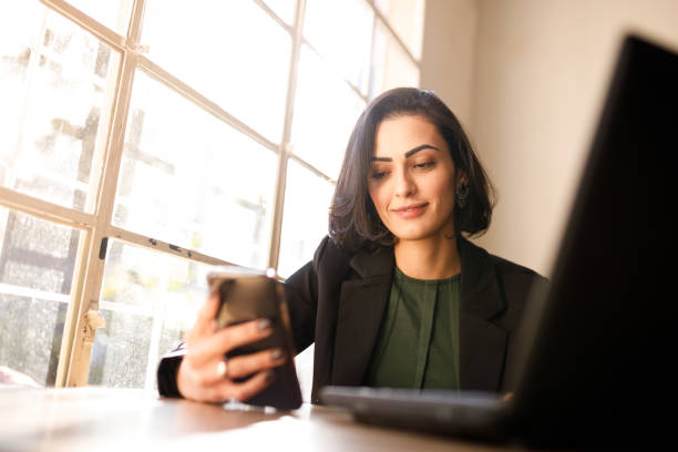 istock Woman doing her finances at coffee shop 1154673017