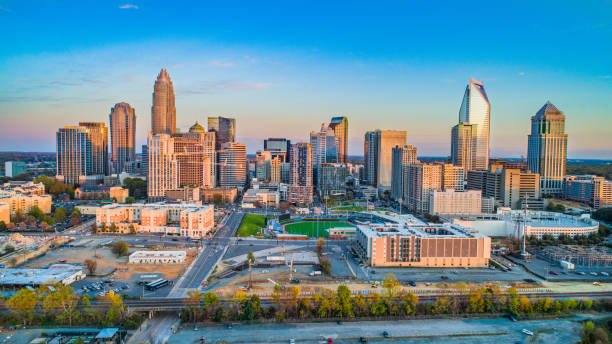 Charlotte North Carolina NC Downtown Skyline Aerial Charlotte North Carolina NC Downtown Skyline Aerial. university of north carolina photos stock pictures, royalty-free photos & images