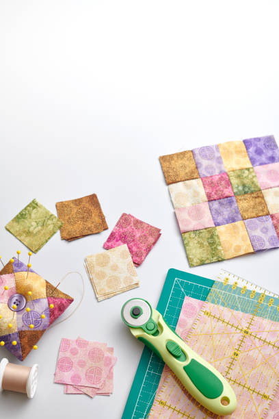 istock Bright square pieces of fabric, quilting tools, sewing equipment, traditional patchwork, space for text 1154676683