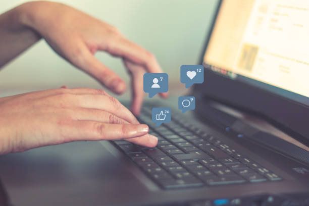 istock Woman using laptop. Social media and social network concept 1154680664