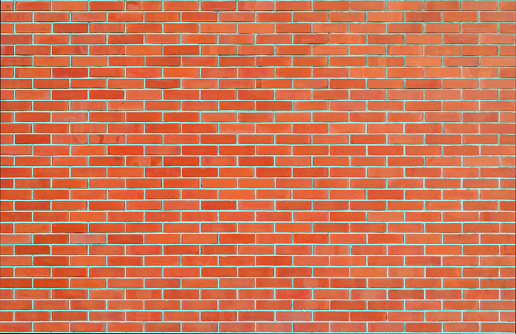 Brick wall texture background in red tone
