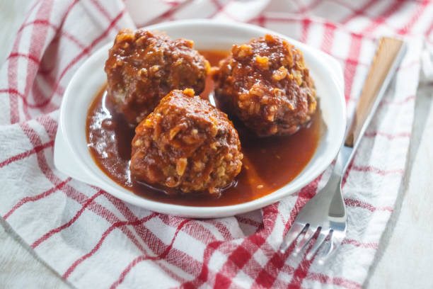 Meat, chicken meatballs in tomato sauce. Close-up. The concept of simple healthy and proper food. Meat, chicken meatballs in tomato sauce. Close-up. The concept of simple healthy and proper food chicken balls stock pictures, royalty-free photos & images