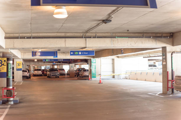 istock 2 hour parking limitation with real time ultrasonic LED direction at modern garage 1154691133