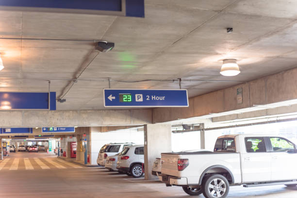 istock 2 hour parking limitation with real time ultrasonic LED direction at modern garage 1154691162