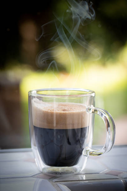 istock Coffee mug with foam and steam 1154691938