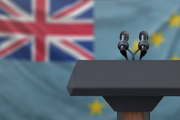 istock Tuvalu Flag at a press conference with microphones 1154693476