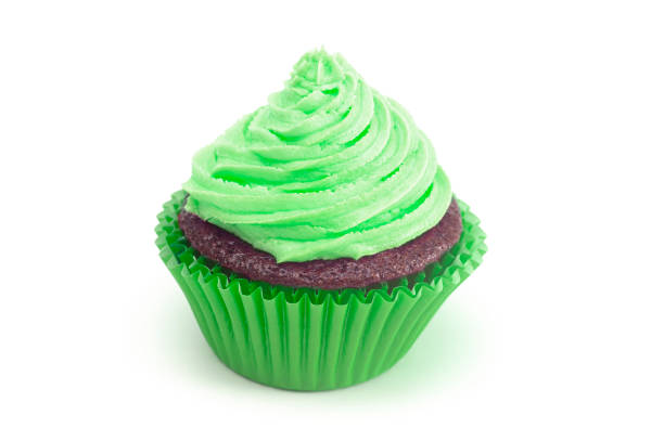 istock Single Green Iced Chocolate Cupcake Isolated on a White Background 1154695347