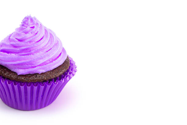 istock Single Purple Iced Chocolate Cupcake Isolated on a White Background 1154695351