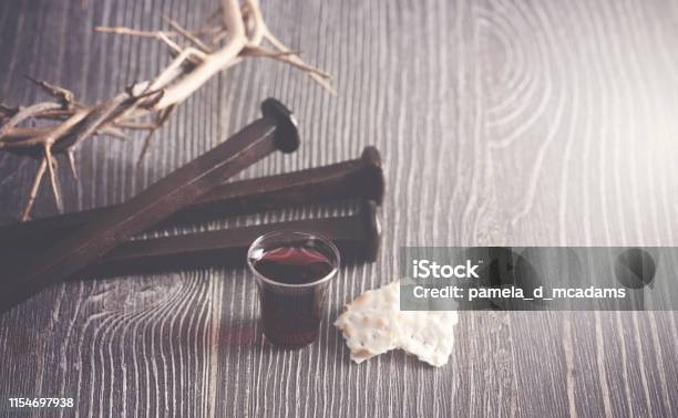 Symbols Of The Crucifixion Of Christ Alongside The Communion Stock Photo - Download Image Now